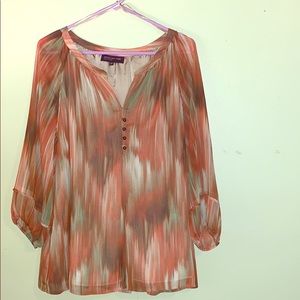 Women’s multi colored blouse.